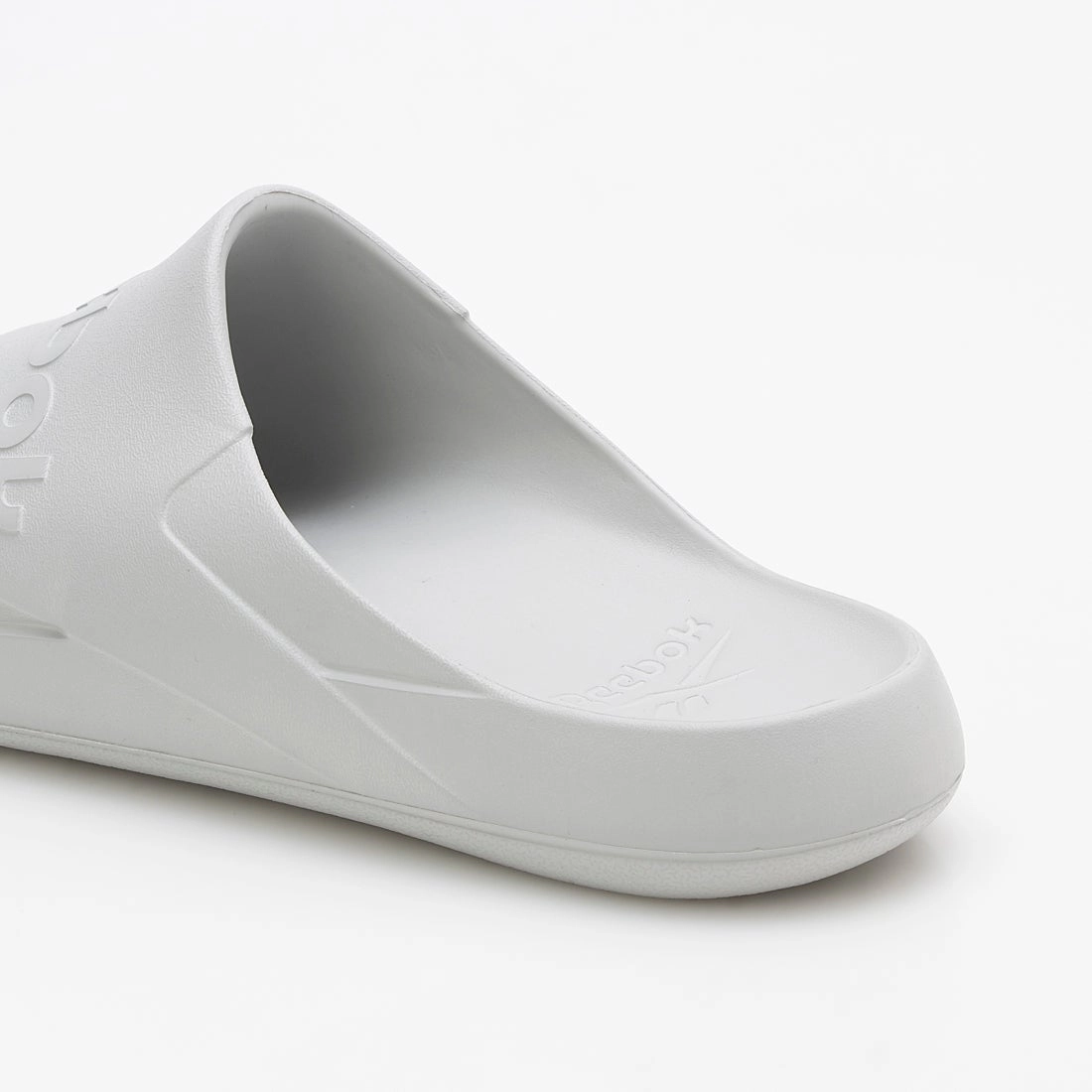 Claquettes Unisexe Reebok Clean Slide GRIS 100200313 https://chb7.com original Algerie DZ Claquettes Unisexe Reebok Clean Slide GRIS 100200313 https://chb7.com original Algerie DZ