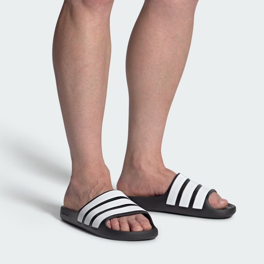 Claquettes adidas Adilette Flow noire et blanc IF4134 https://chb7.com original Algerie DZ Claquettes adidas Adilette Flow noire et blanc IF4134 https://chb7.com original Algerie DZ